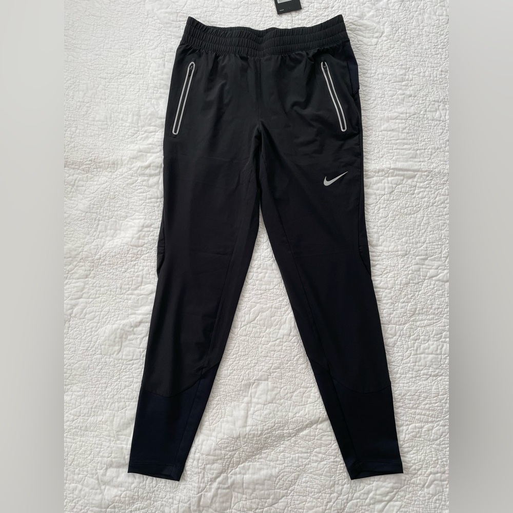 Nike Women’s Swift RunningPants in Black. NWT size Small